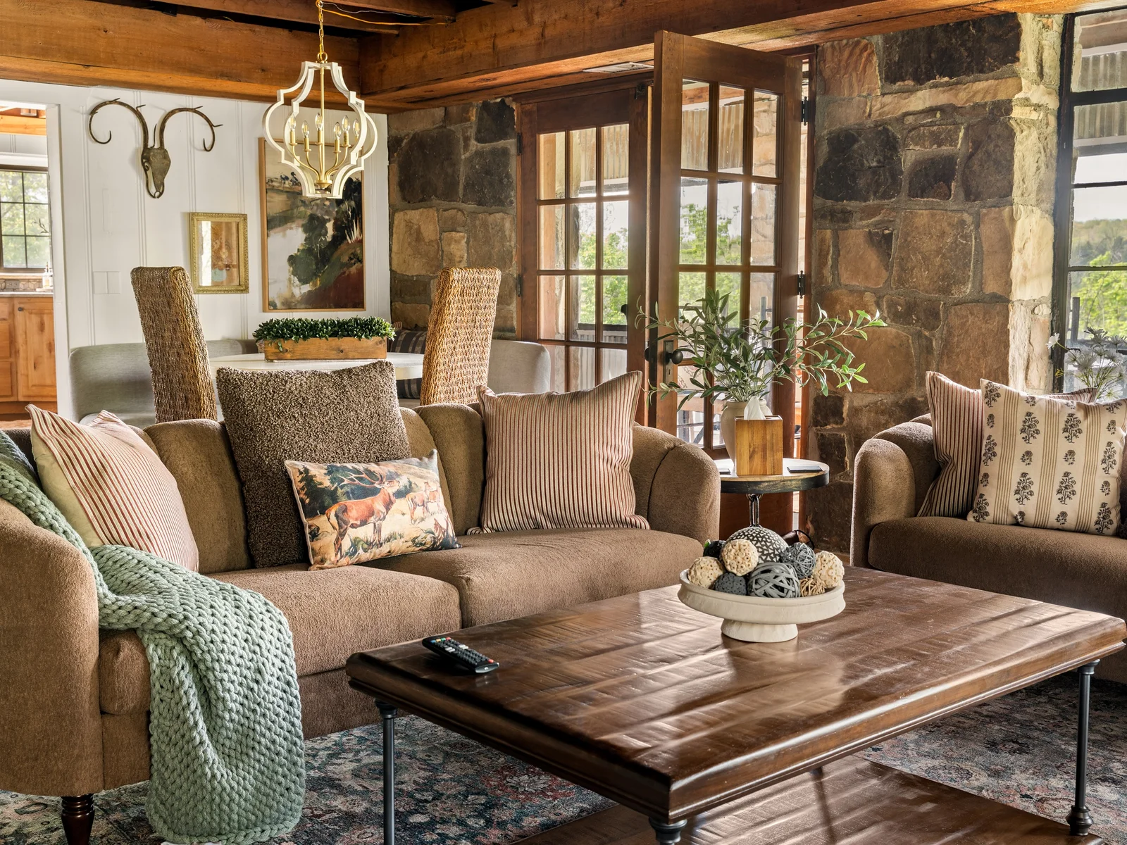 Comfortable seating and layered textures create the perfect place to unwind.