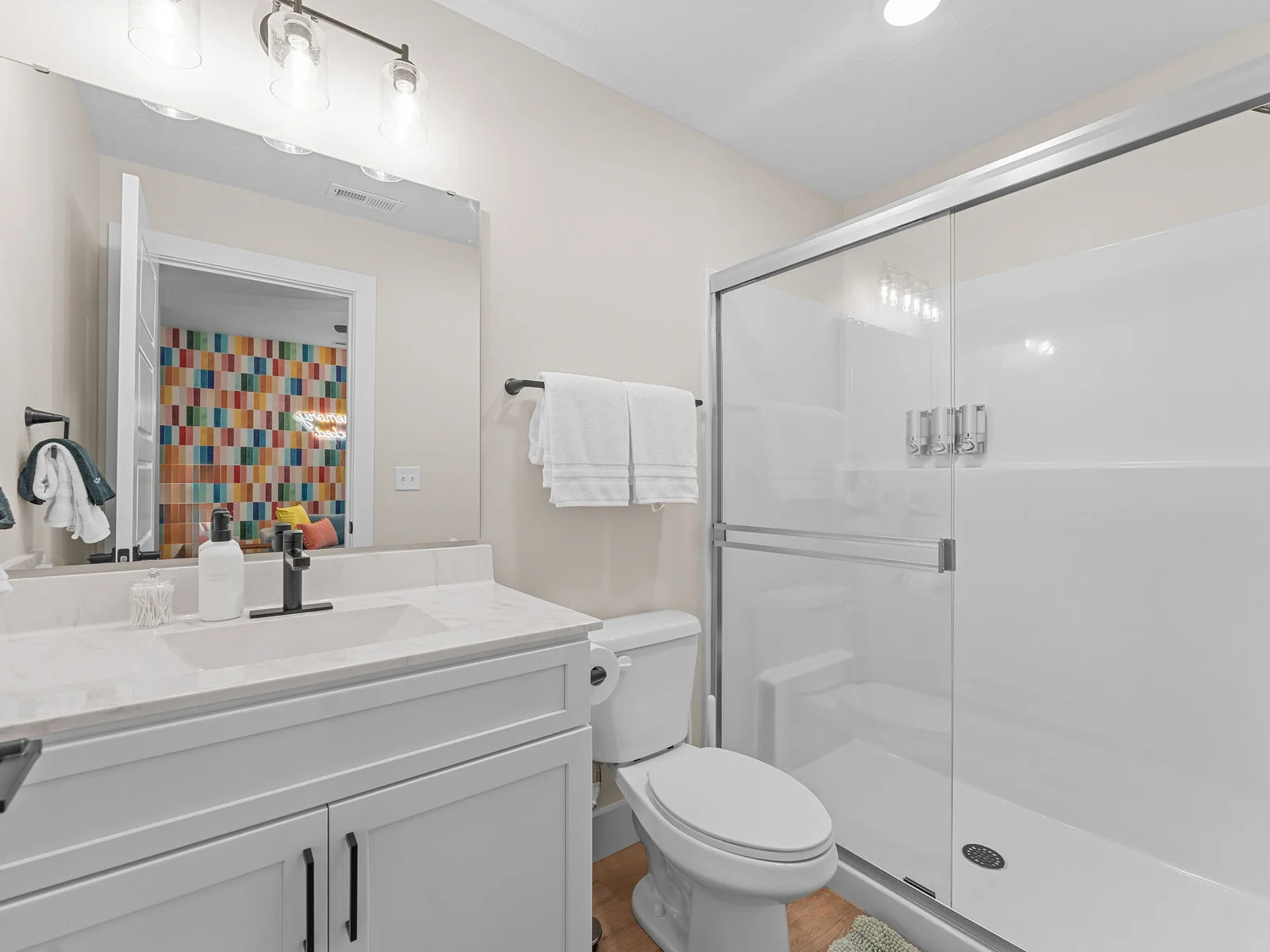 A convenient bathroom just steps away from the game room for uninterrupted fun.