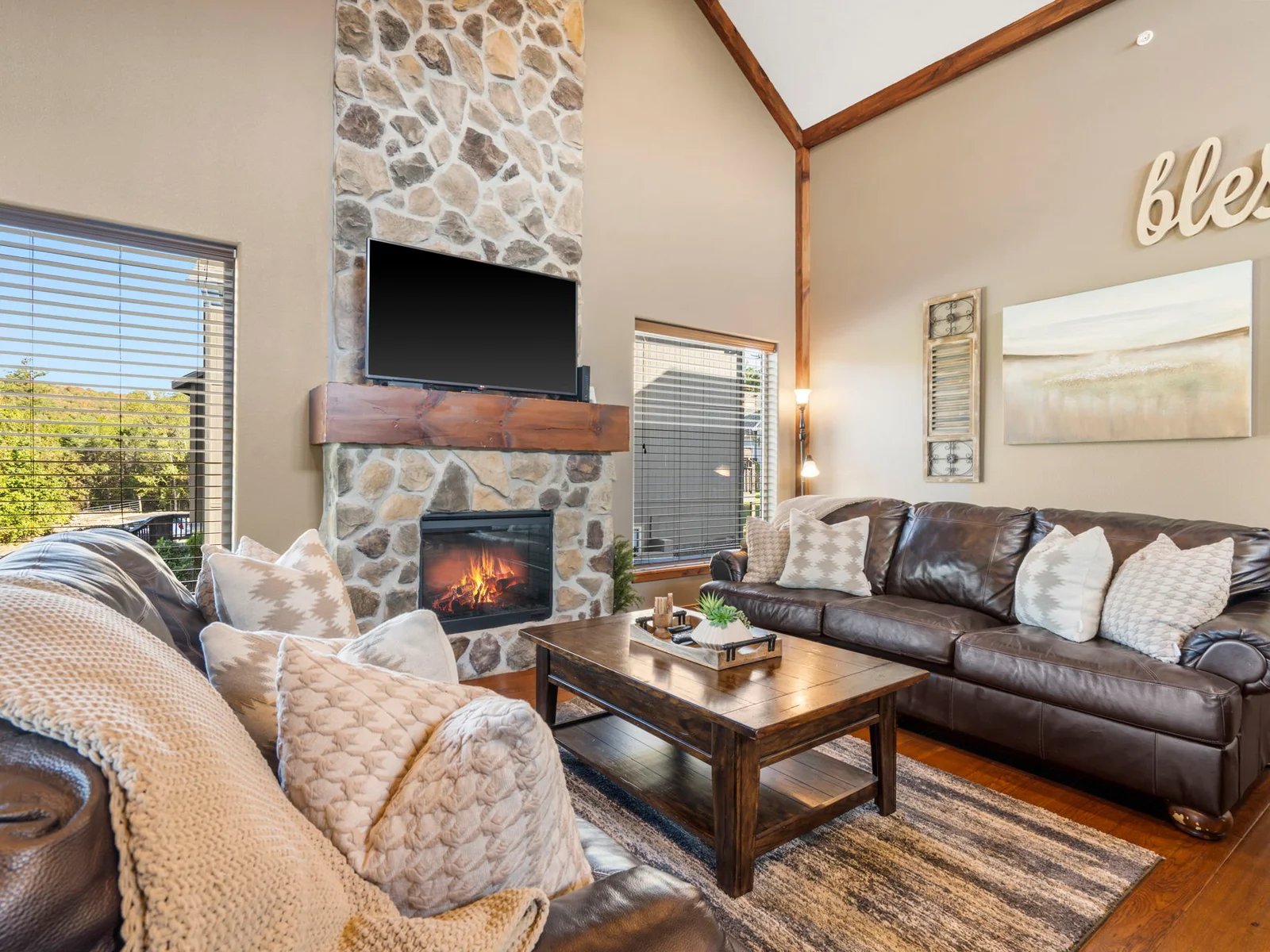 Cozy comfort in the vaulted living room with electric fireplace