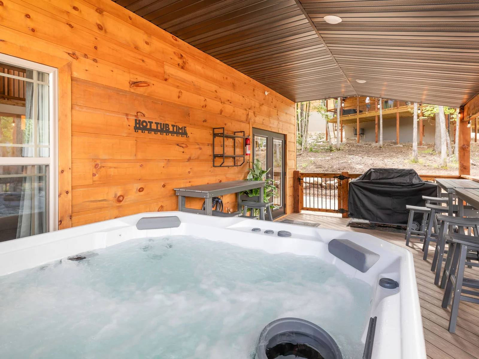 Relax in the hot tub or grill on your back deck!