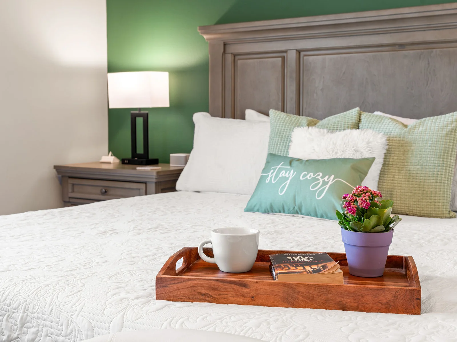 Sink into plush pillows and luxury white bedding — fall into this king bed after a full day in Branson.