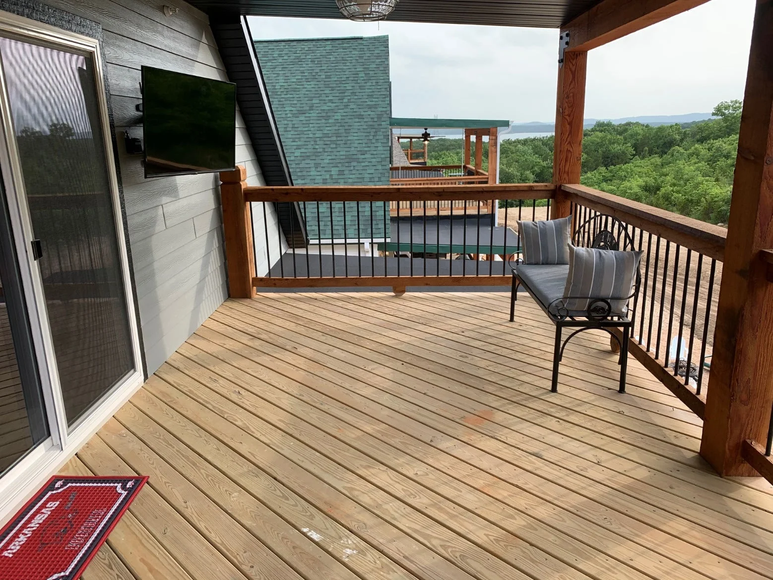 Private deck off of Razorback room with lake view