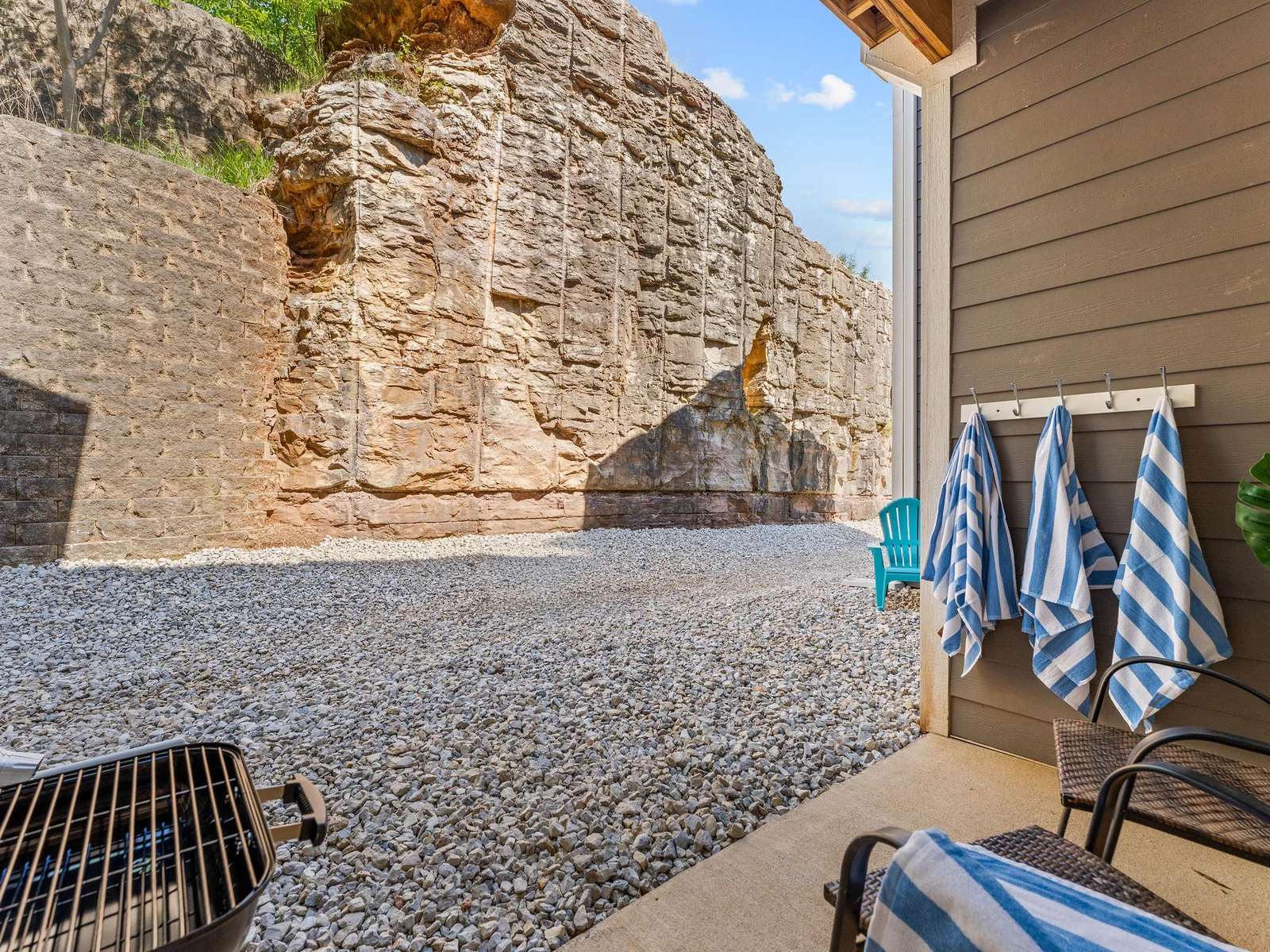 Most Branson balconies face a parking lot. Yours faces a natural rock bluff. It's quiet, completely private, and a genuinely good spot for morning coffee before anyone else is up.