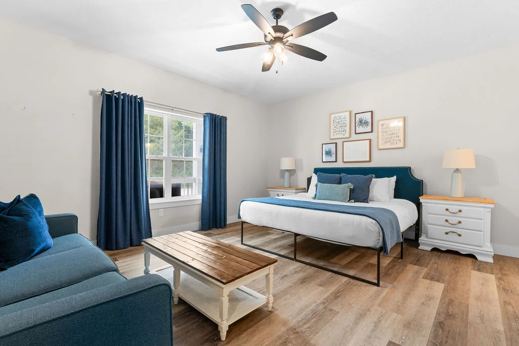 Main level King bedroom w/ ensuite bath and sofa