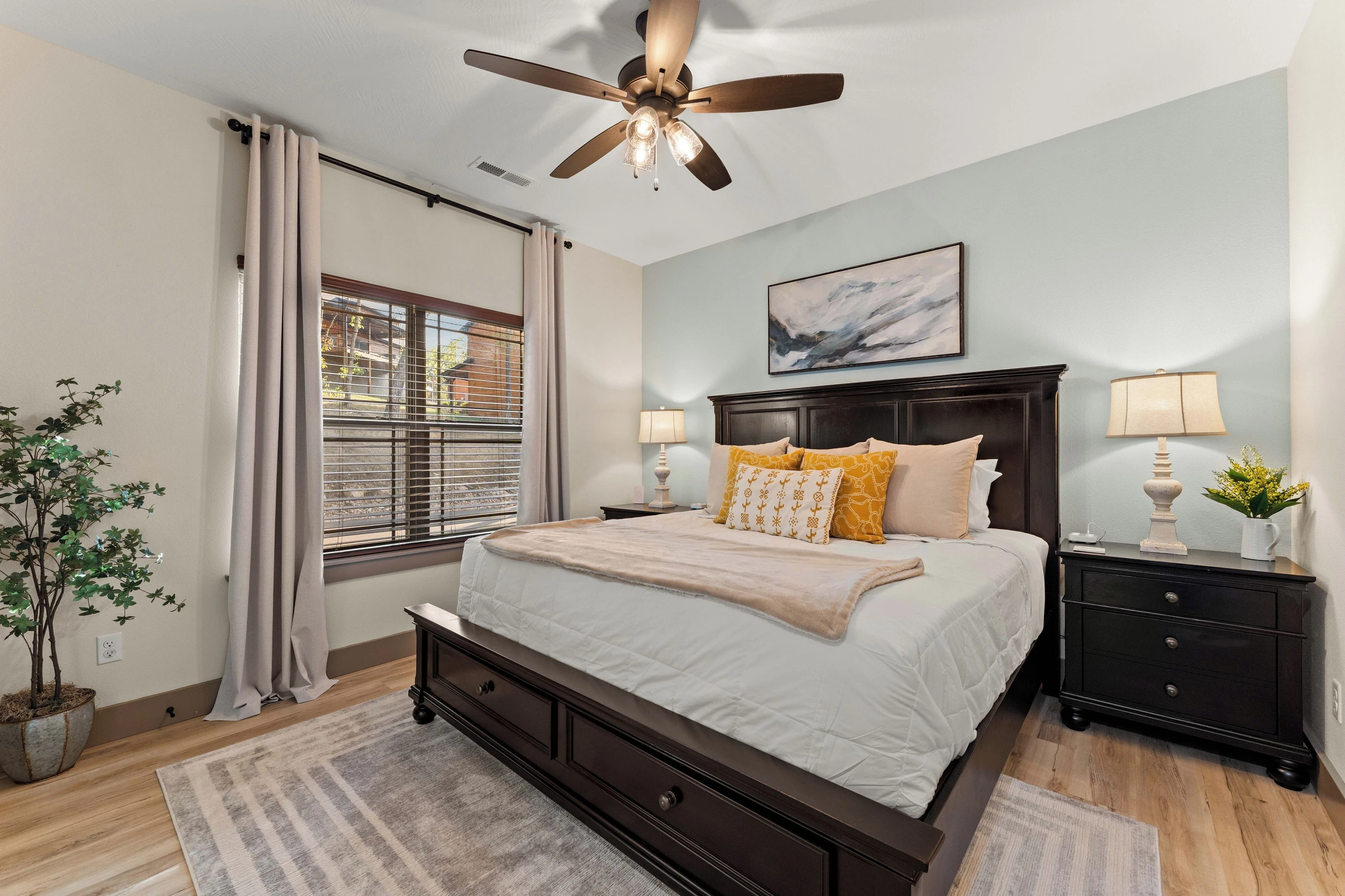 Bedroom on the left. Blackout curtains, king size bed, sound machine all provided for your comfort.