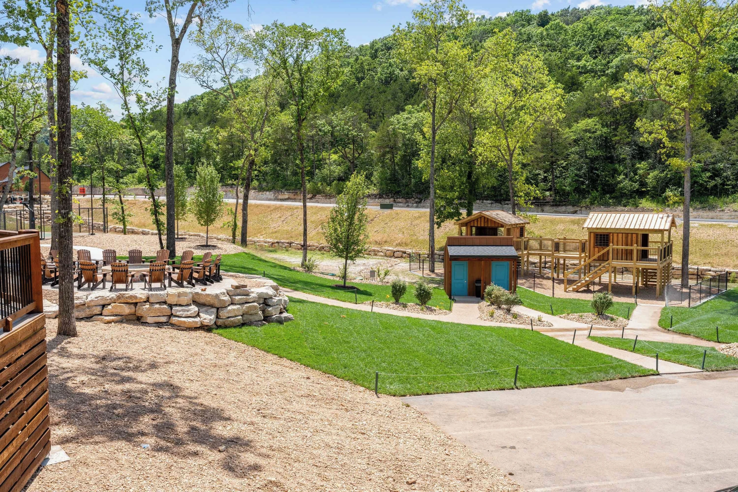 Community fire pit with children playground close by.