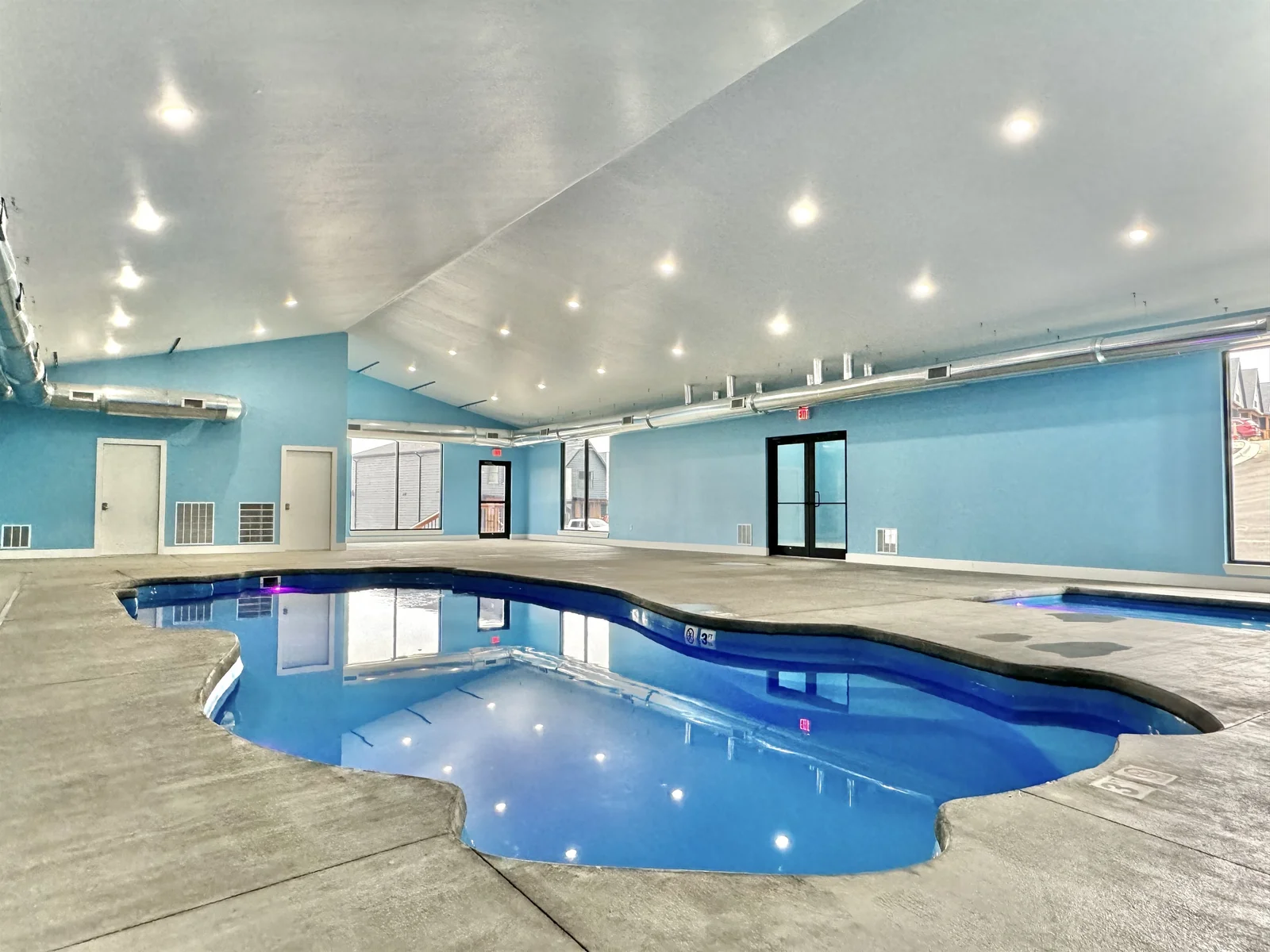 Heated indoor pool with children's wading pool.