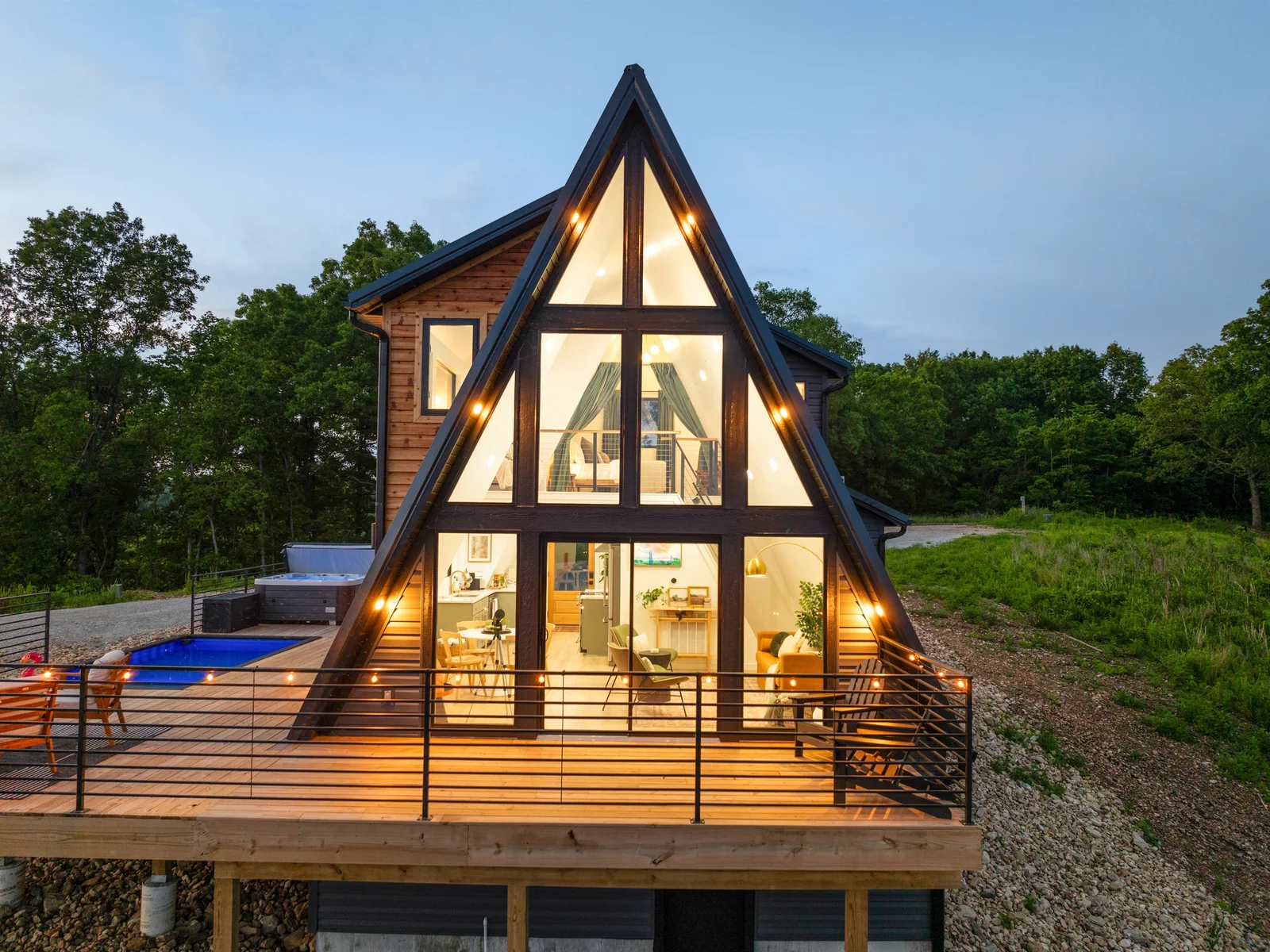 Skyline A-Frame—where modern design meets peaceful lake views.