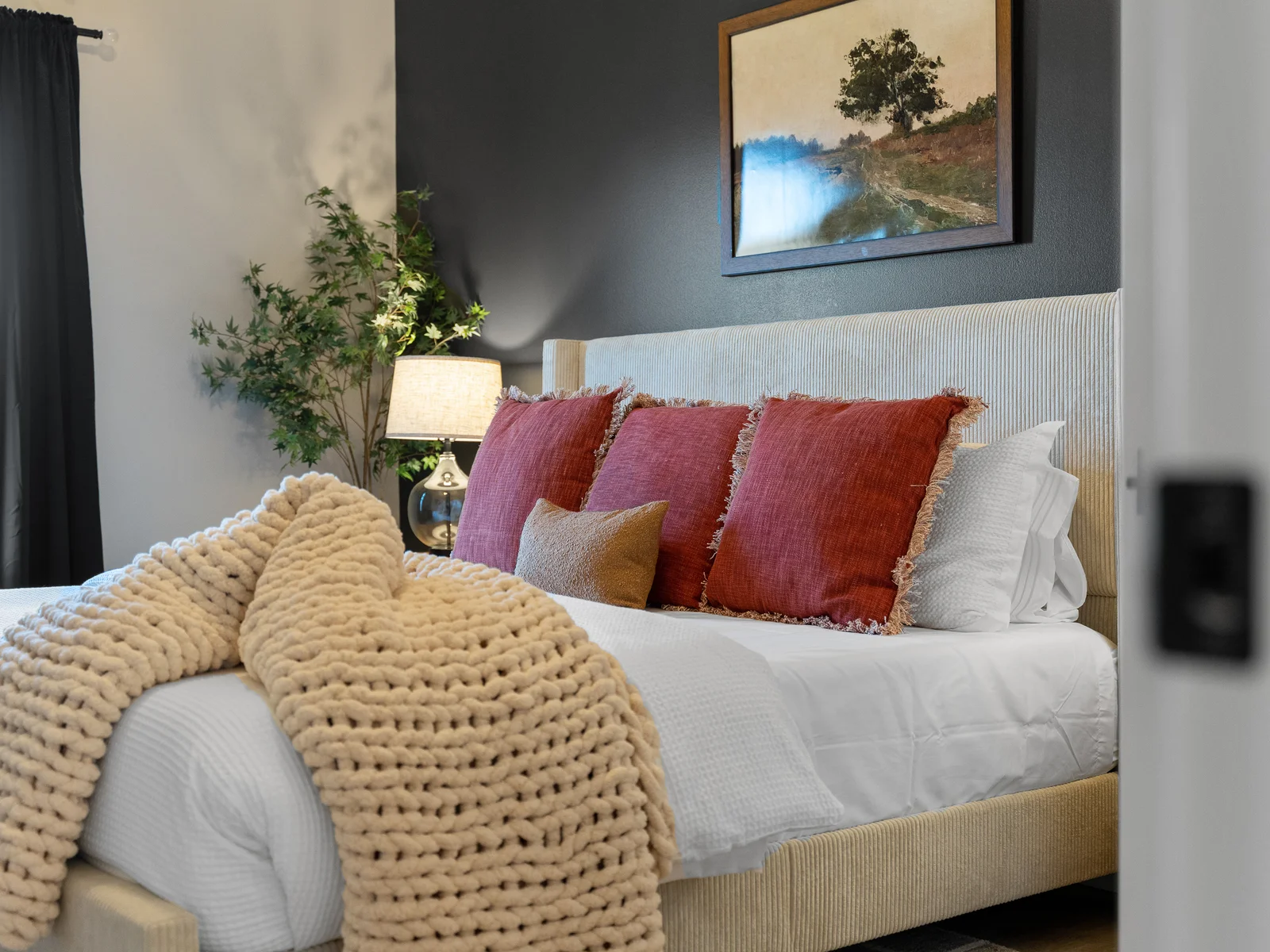 Master Bedroom: Chic decor with plush bedding, perfect for unwinding after a day of adventure!