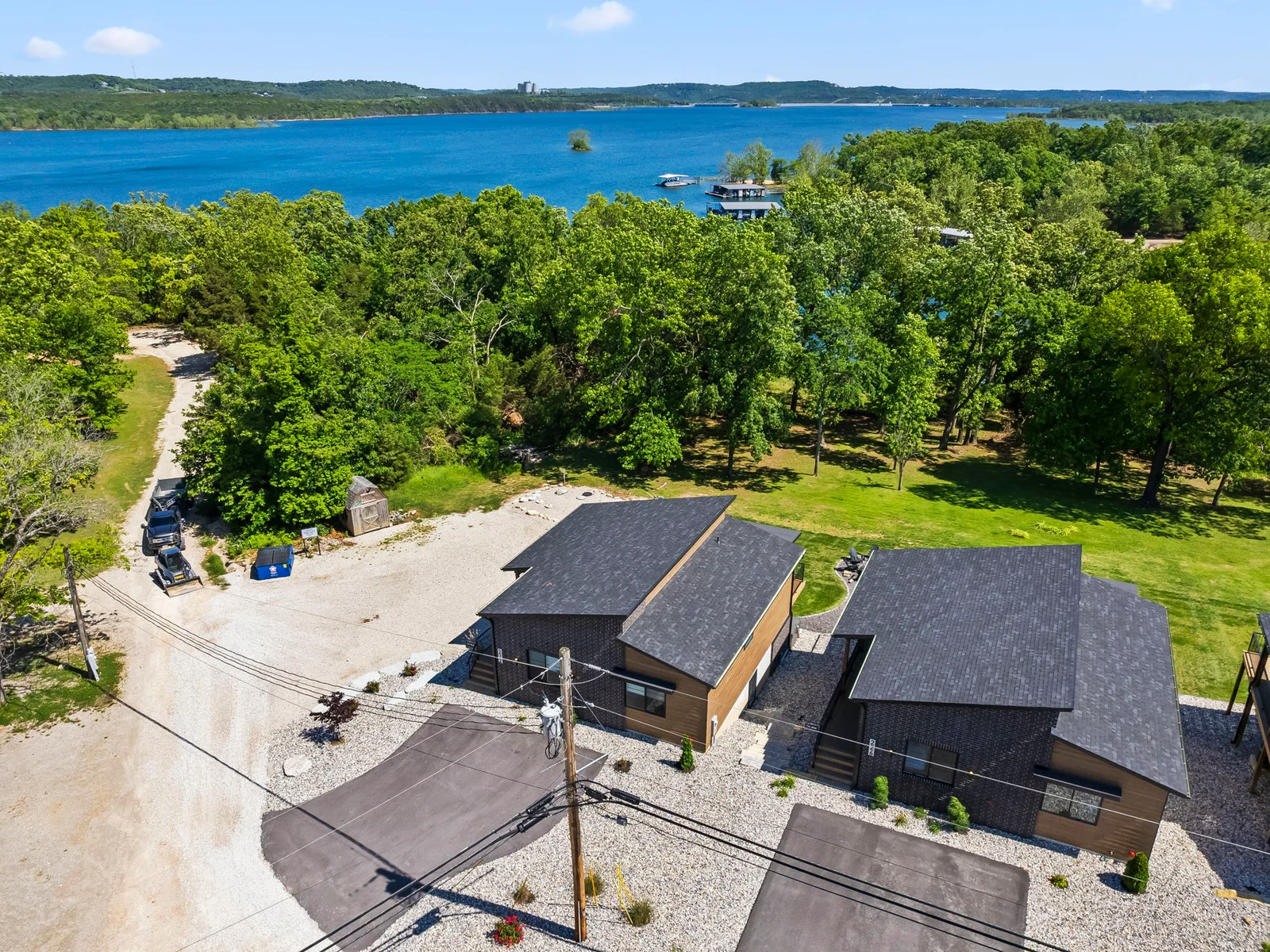 Aerial view. There are 4 identical homes that share the outdoor space.