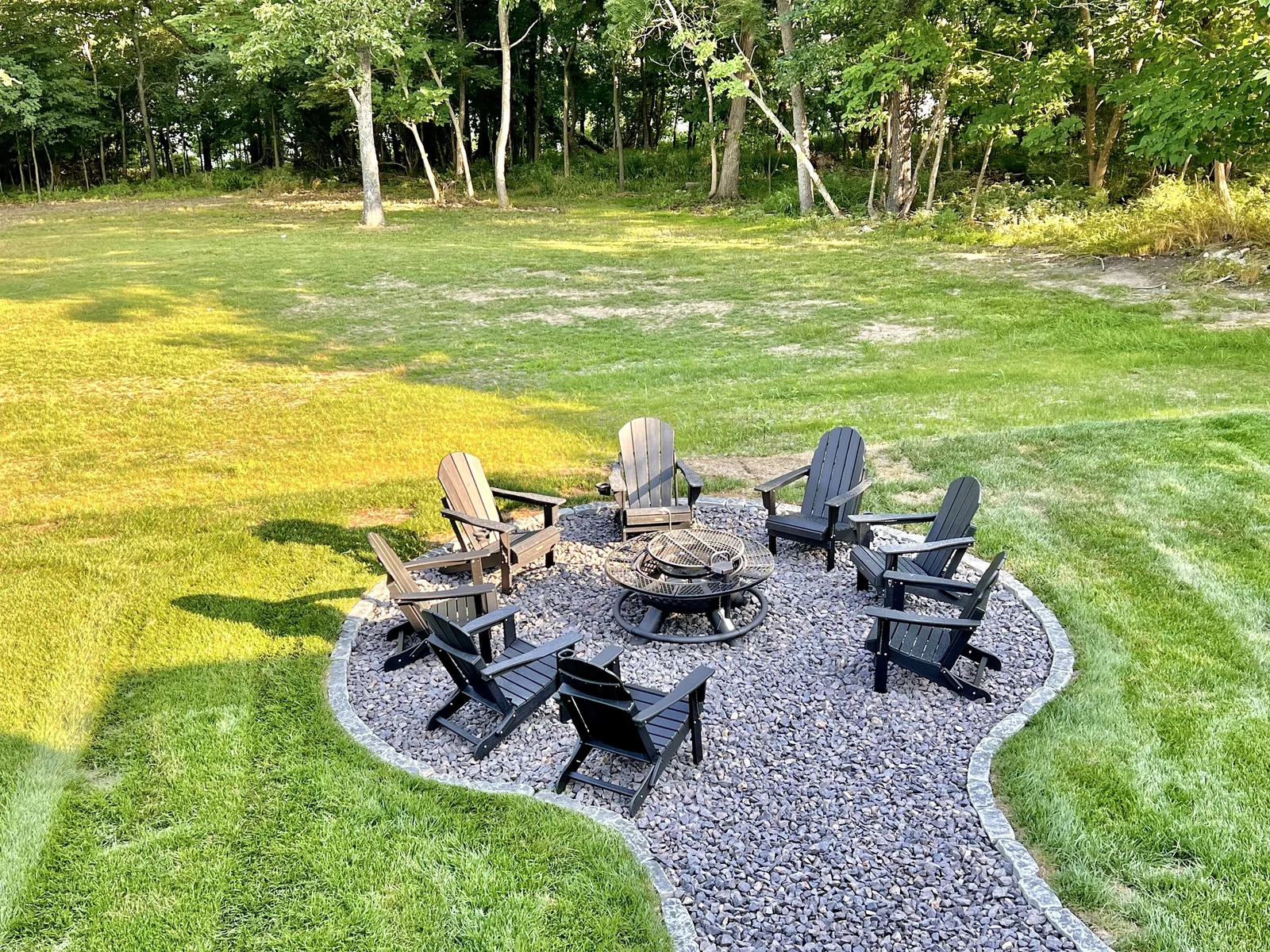Shared fire pit located just outside the back porch