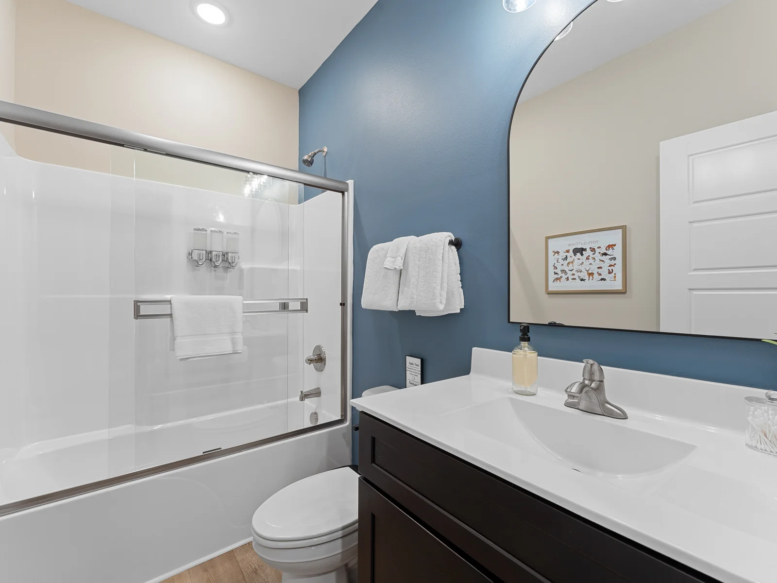 Full Bathroom: Refresh and unwind in this stylish bathroom with modern touches and vibrant hues!
