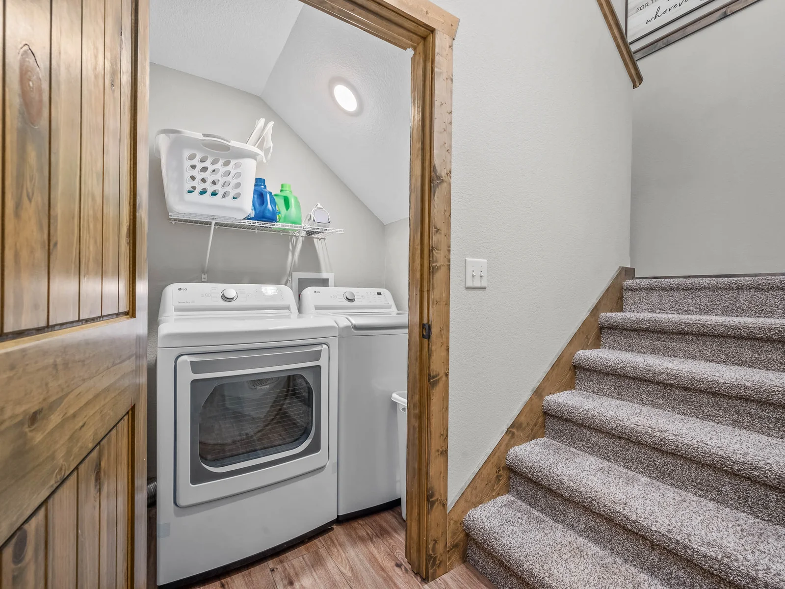 Lower level full sized washer and dryer