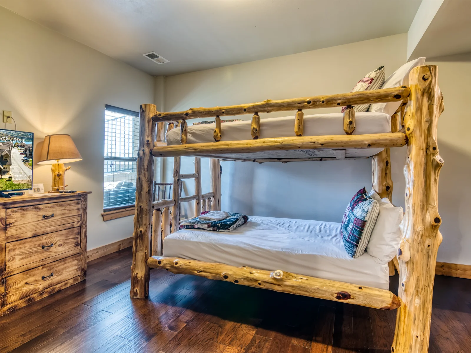 Bunk room has a gaming system for the kids