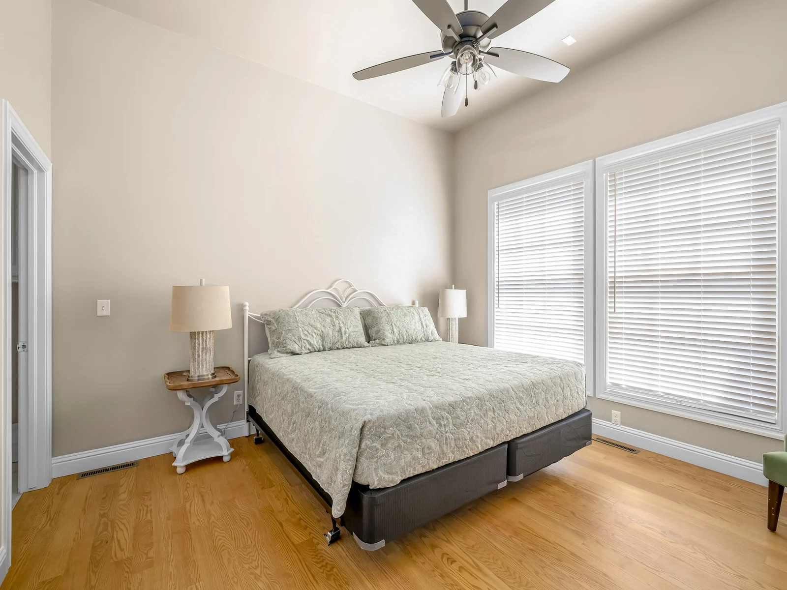 Main level king #1 with ensuite bathroom. There are 2 steps down to this bedroom from the kitchen area.