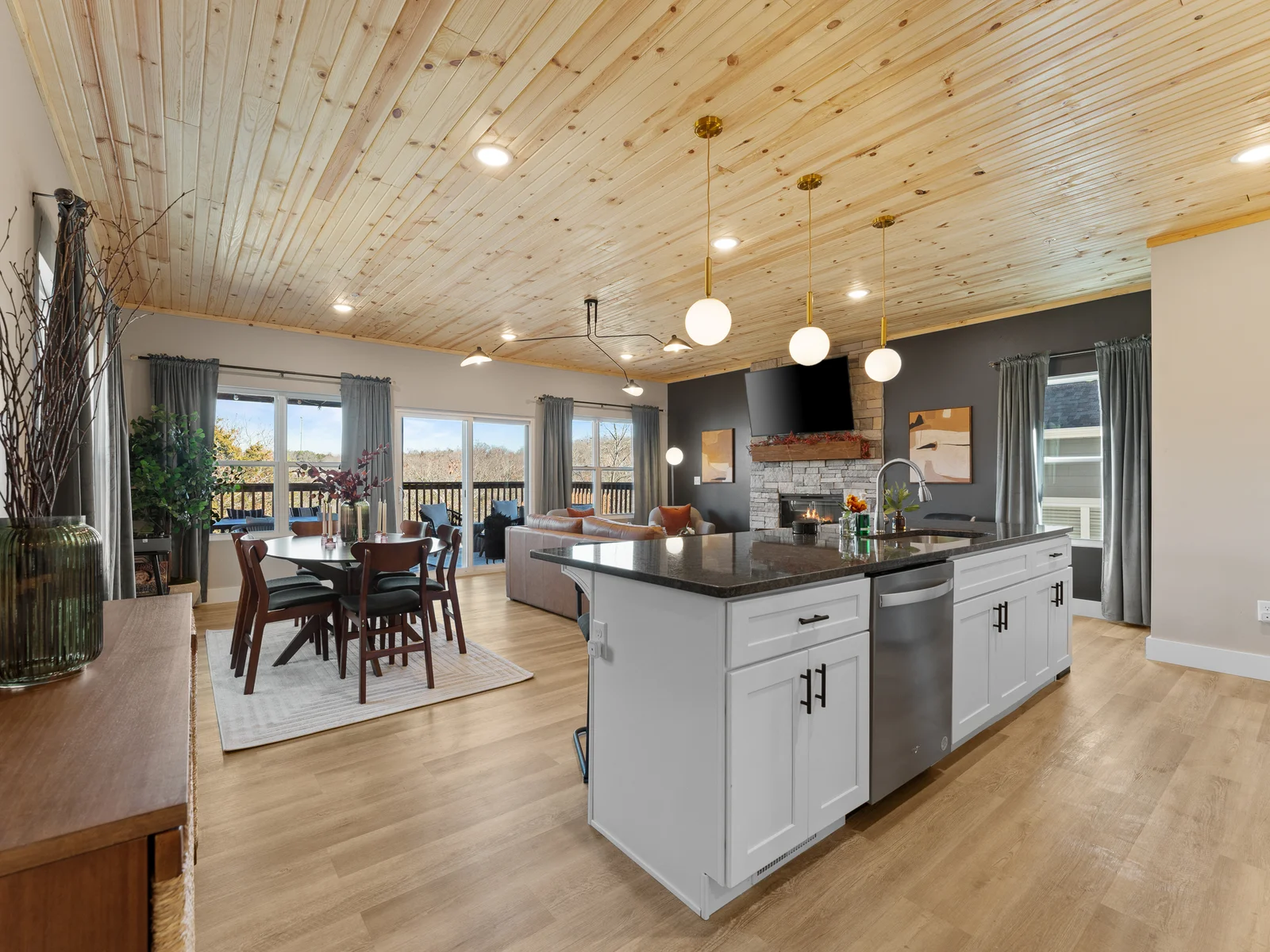 Living Room & Kitchen: Spacious, modern retreat with scenic views and stylish decor awaits you!