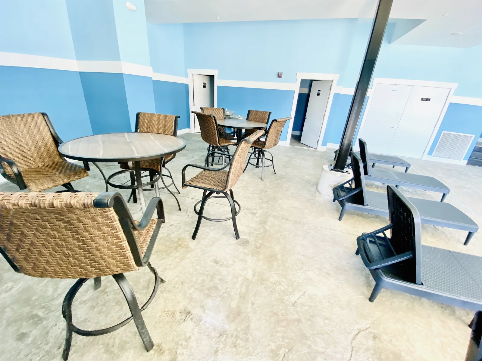 Seating options and bathrooms for the indoor pool area