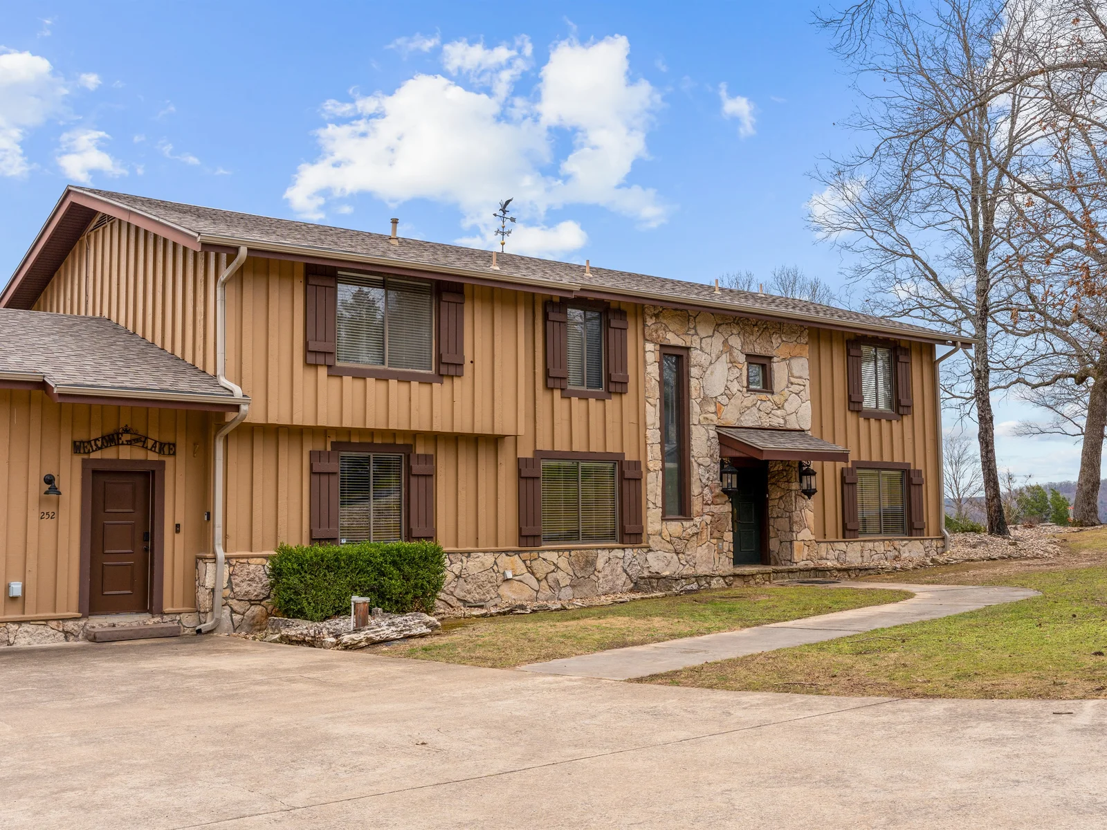 Spacious exterior with easy access, plenty of parking, and room for everyone to settle in comfortably.