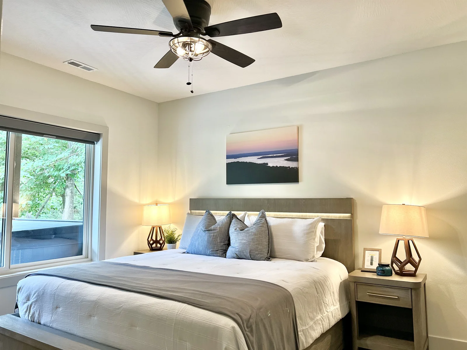 Lower King bedroom with built-in headboard lighting
