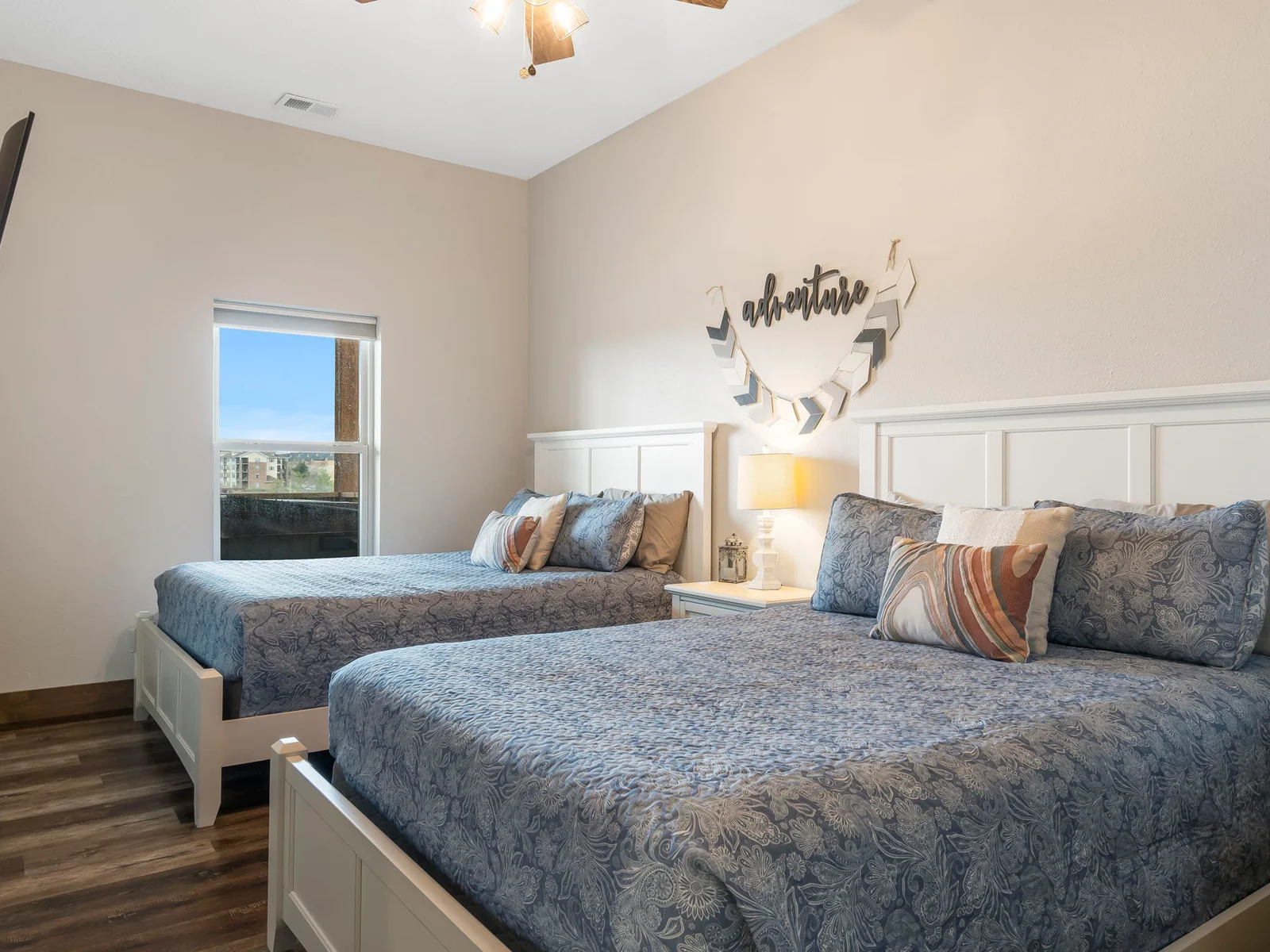 Lower level, double Queen bedroom with amazing views and TV.
