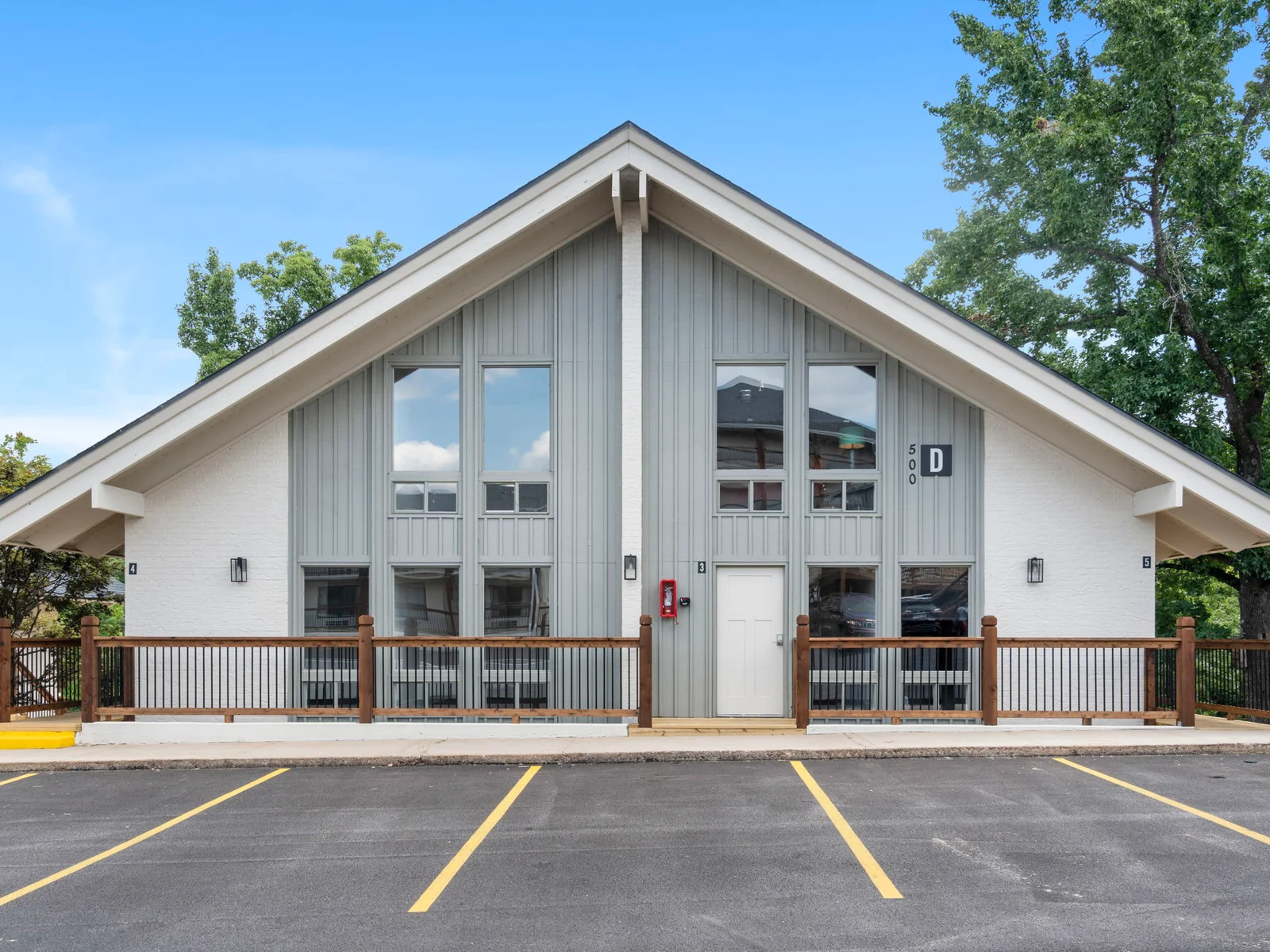 Front of Condo, Lofty Aspirations is on the right overlooking a finger of Lake TaneyComo
