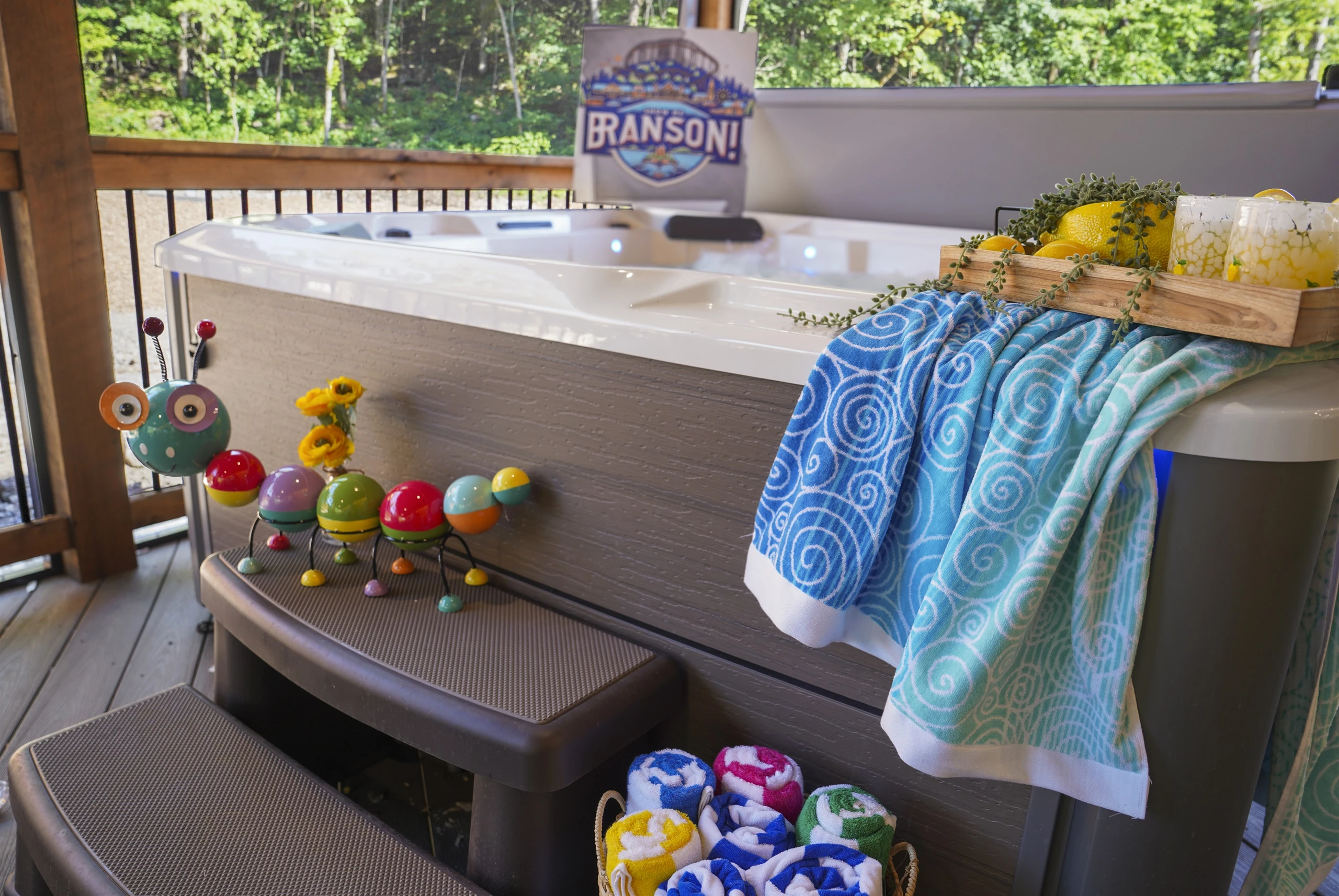 A 6-person hot tub on the covered and screened in deck!