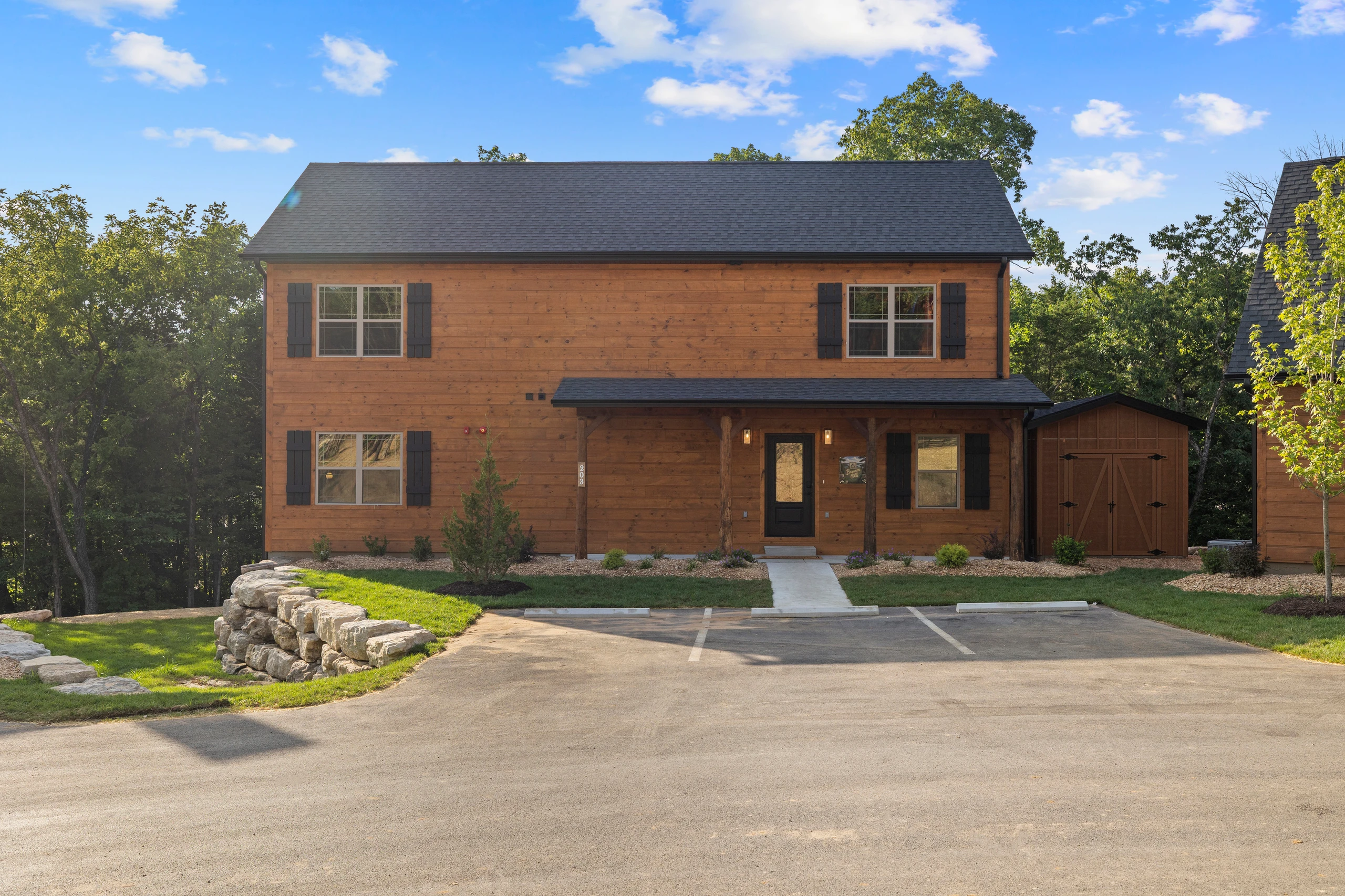 Two stories of board-and-batten cedar with easy, level parking right out front.