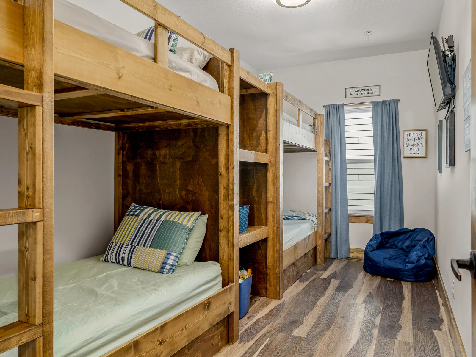 Main level: Minnie May bunkroom with 4 twins and 32" smart TV.