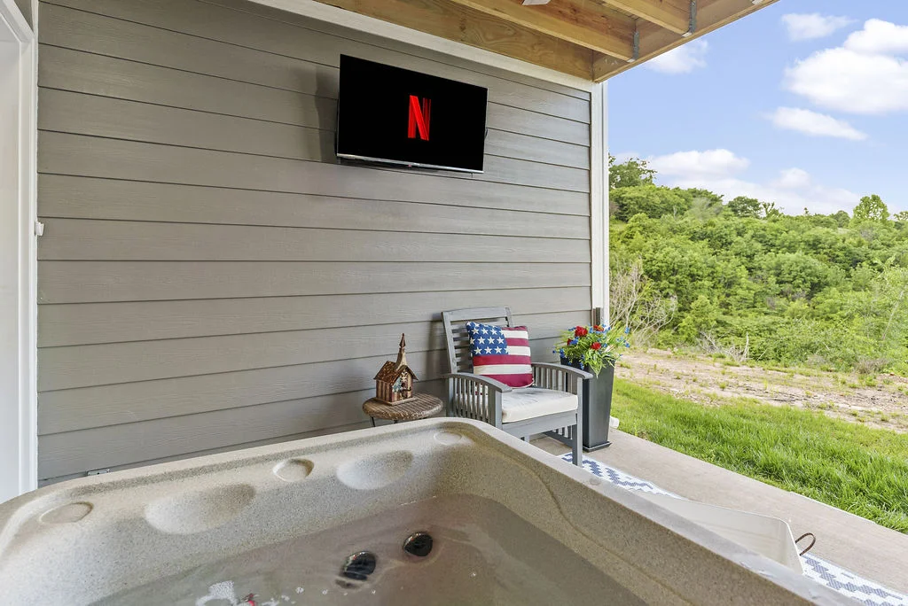 Enjoy your favorite show from the private hot tub on the patio