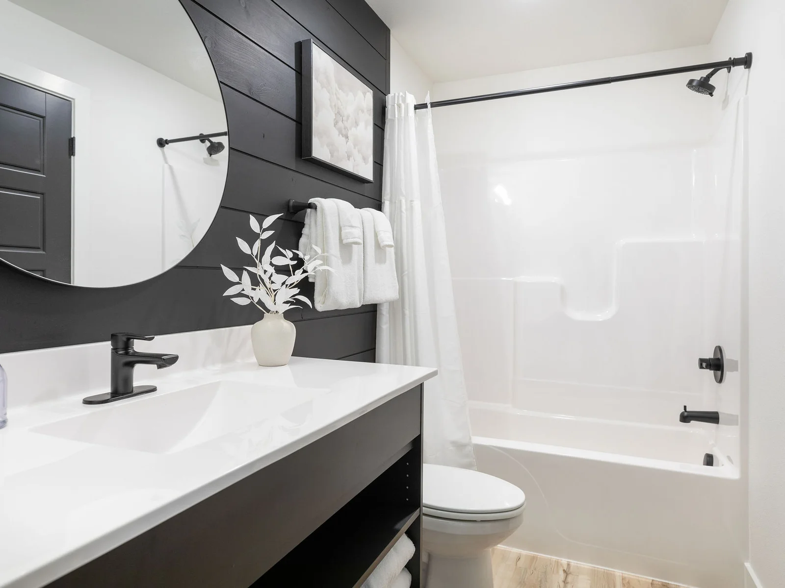 Main level King #3 attached bath. Also accessible from hallway