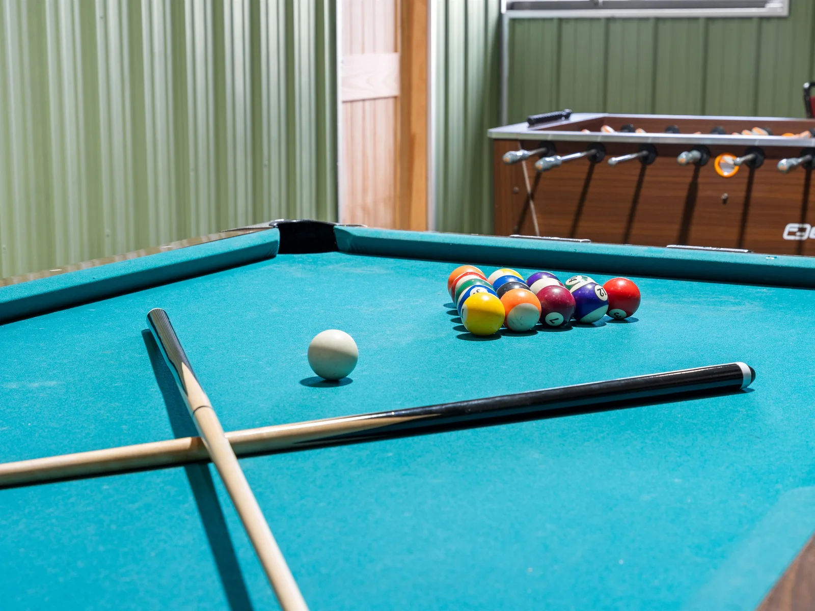 Friendly competition and late-night laughs make this pool table a favorite gathering spot.