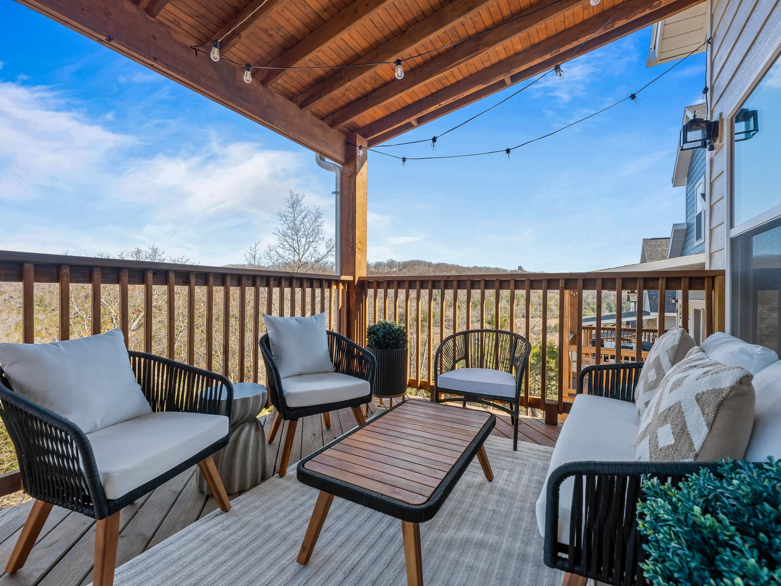 Balcony Retreat: Unwind on the deck with stunning views and comfy seating for unforgettable sunsets!