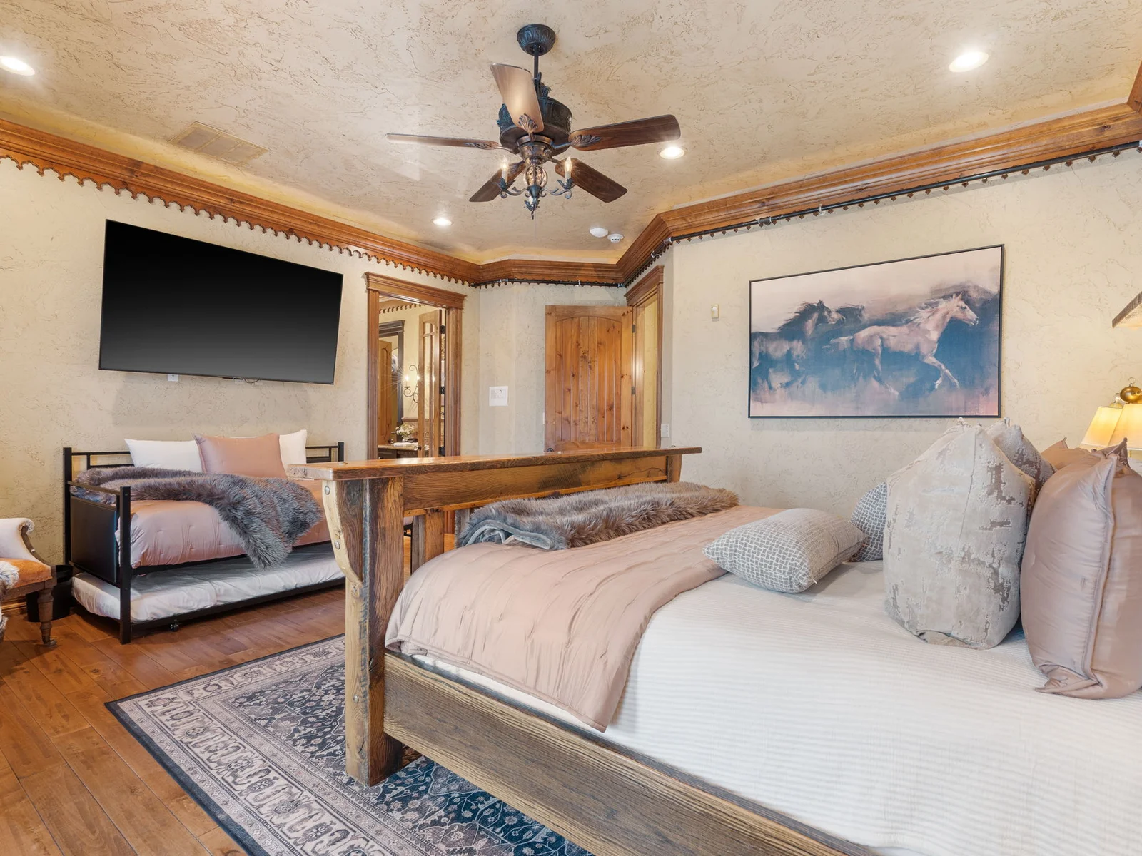 Kind bed with a daybed and trundle for plenty of sleeping!