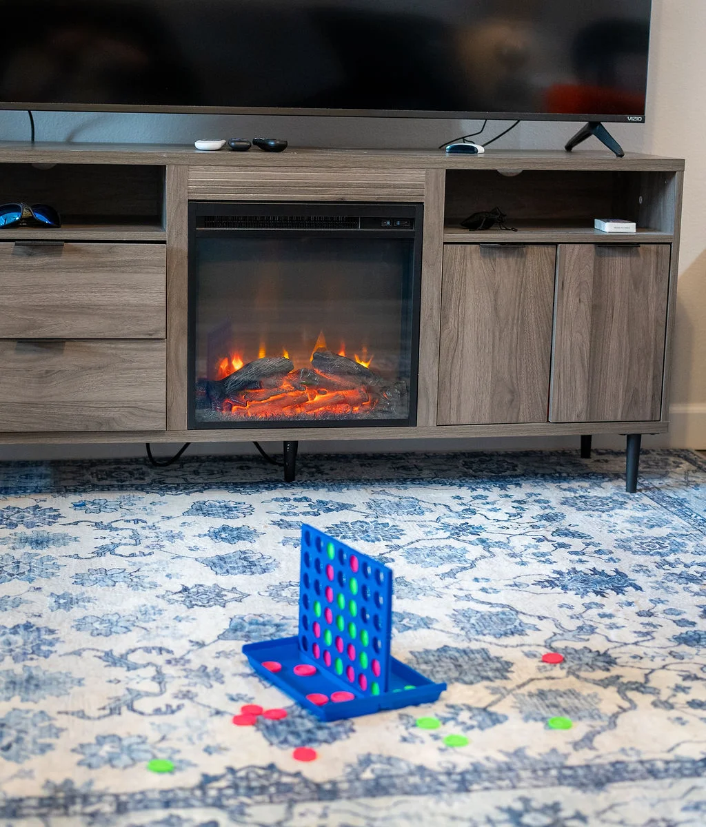 Cozy up by the electric fireplace and watch your favorite show.
