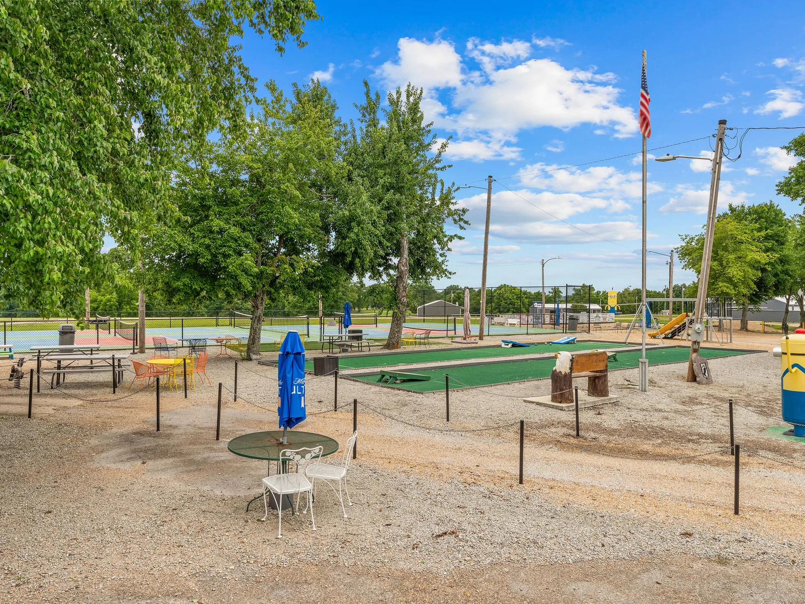 Bocce, cornhole, and lawn games at Lost Woods Hideaway — easy ways to fill an afternoon between the lake and the fire pit.
