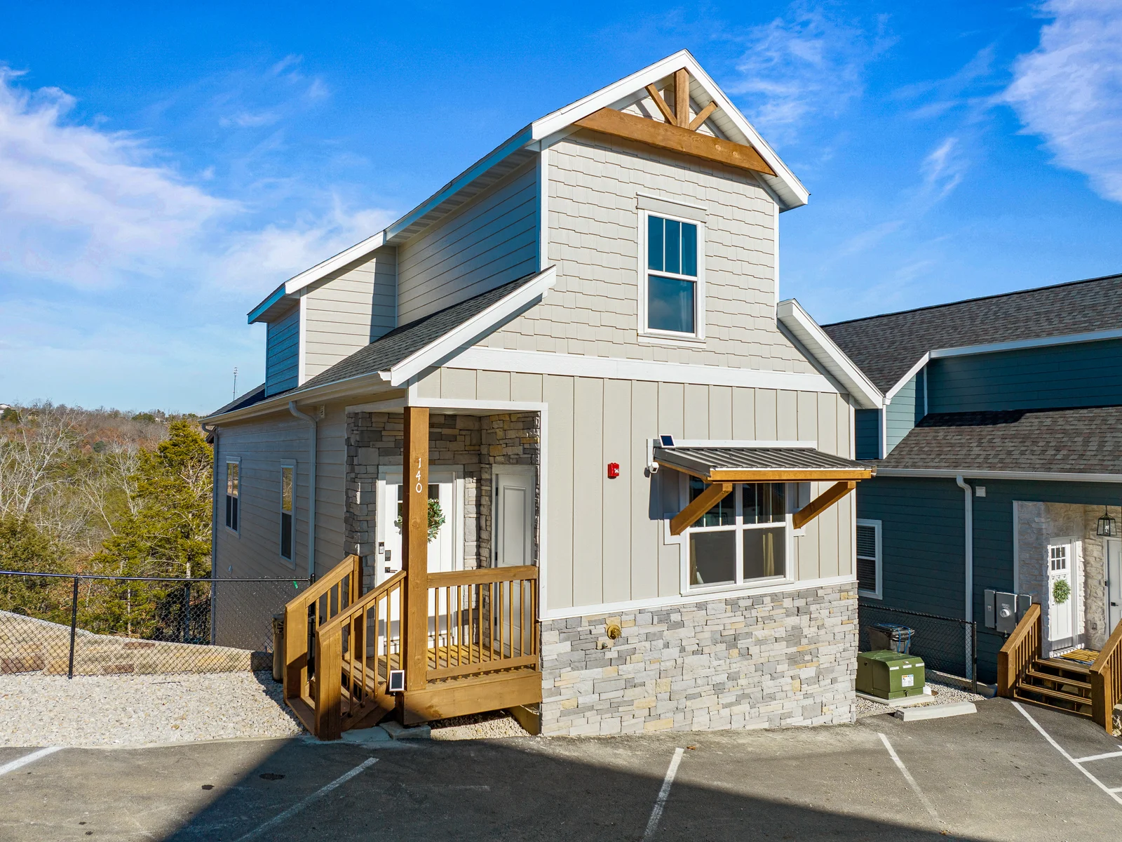 Exterior: Charming home with inviting entrance, perfect for your Branson adventure!