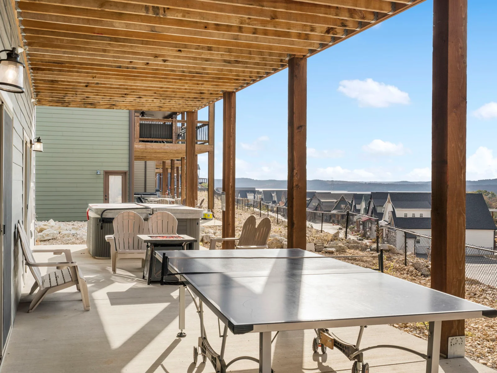 Ping pong, fire pit, and hot tub on the lower deck!