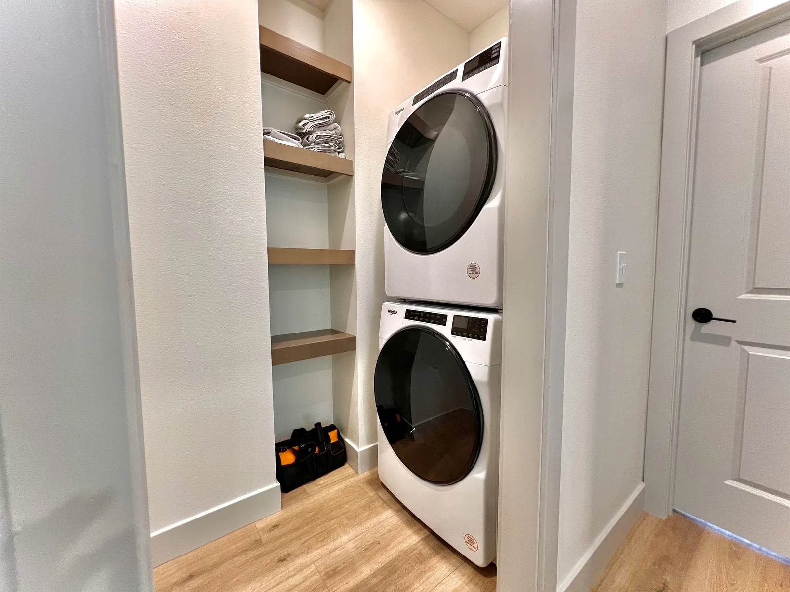Stacked washer and dryer on main level