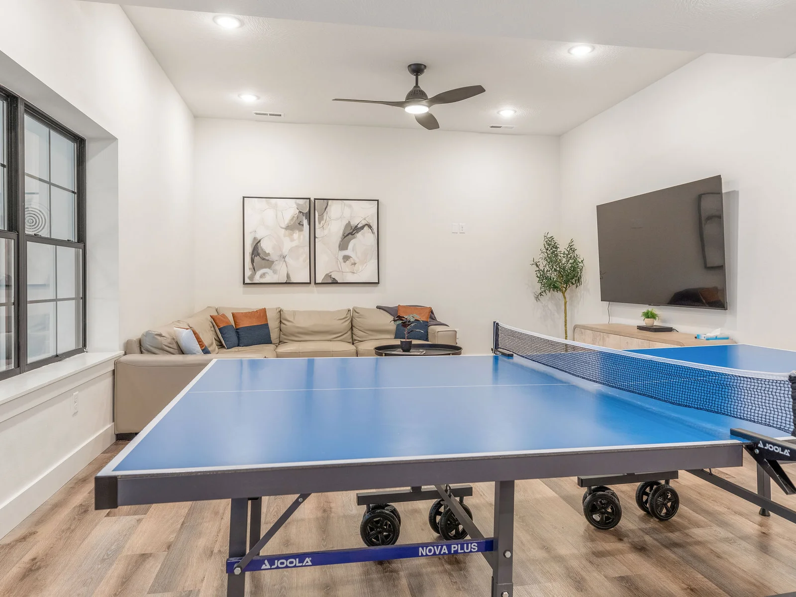 challenge the family to a ping pong tournament