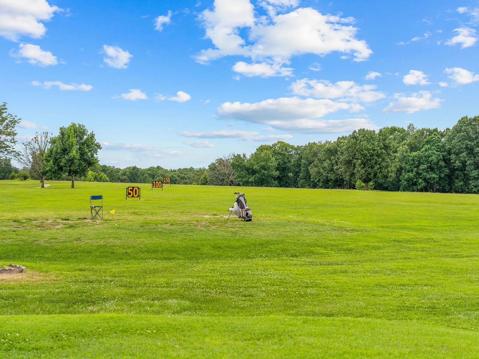 A full golf driving range inside Lost Woods Hideaway — bring your driver, work on your swing, and add nine holes to the trip agenda.