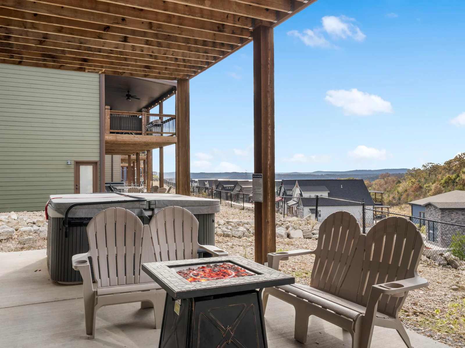 Enjoy a fire next to the hot tub on the lower deck!
