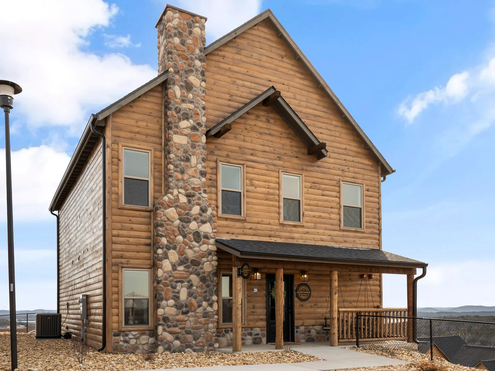 Front elevation of the home. Parking spots right out front.