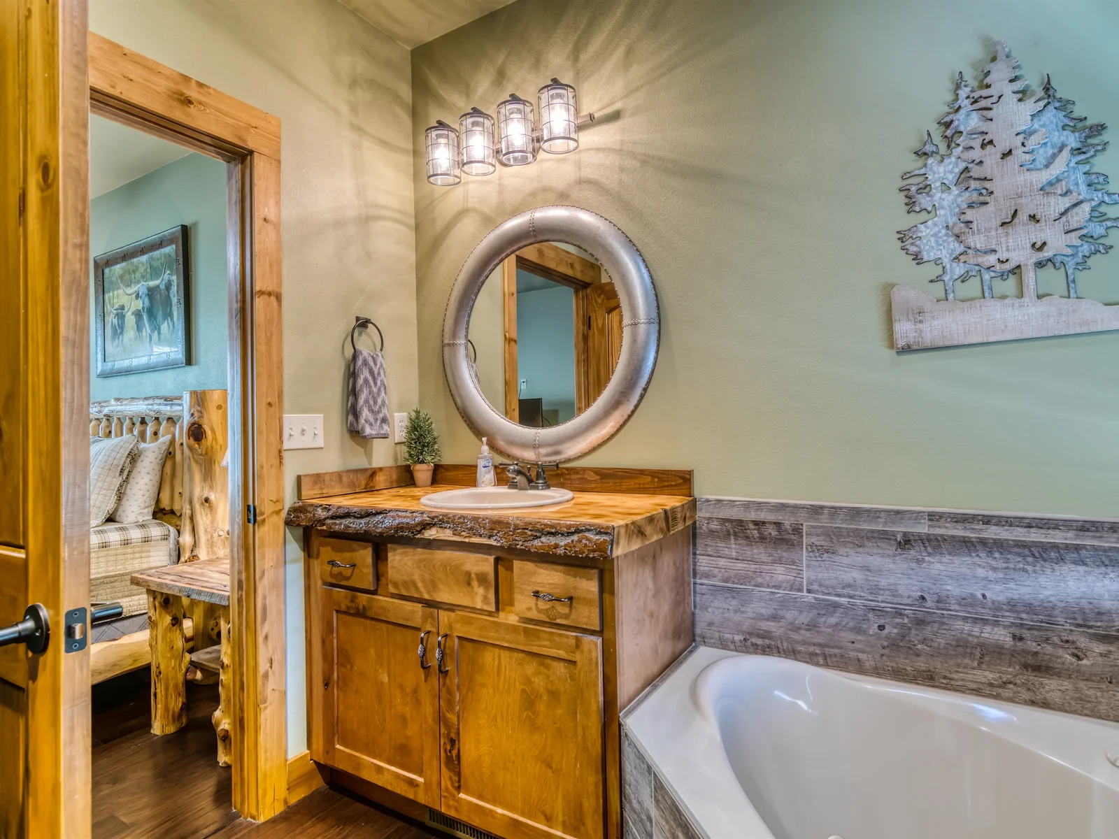 Main level bathroom with shower and jacuzzi tub