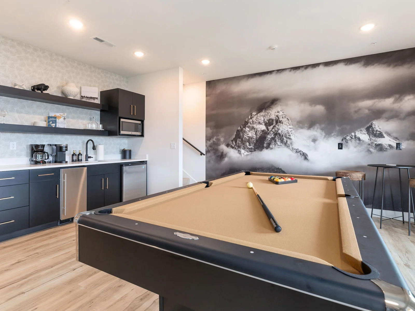 Lower-level game room is ready for your billiards competition