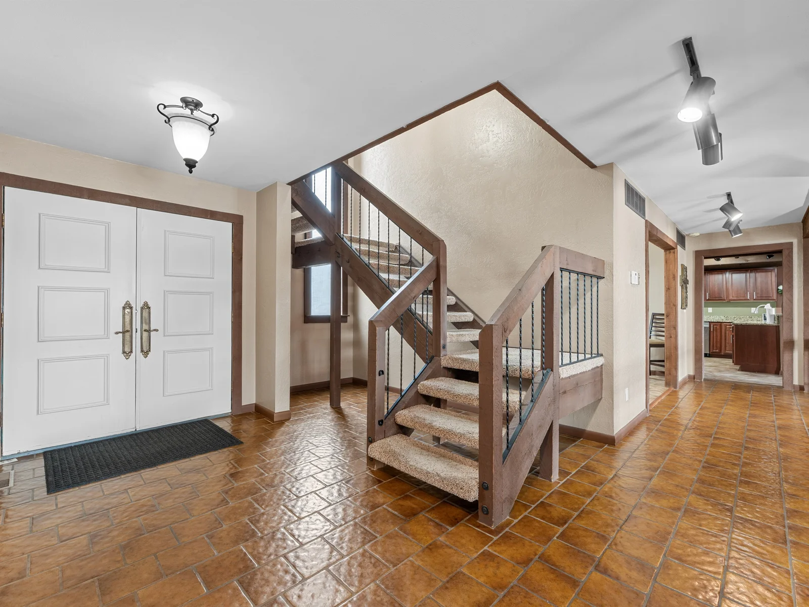 A welcoming entry sets the tone for a relaxed, lodge-style stay with room for everyone to come and go comfortably.