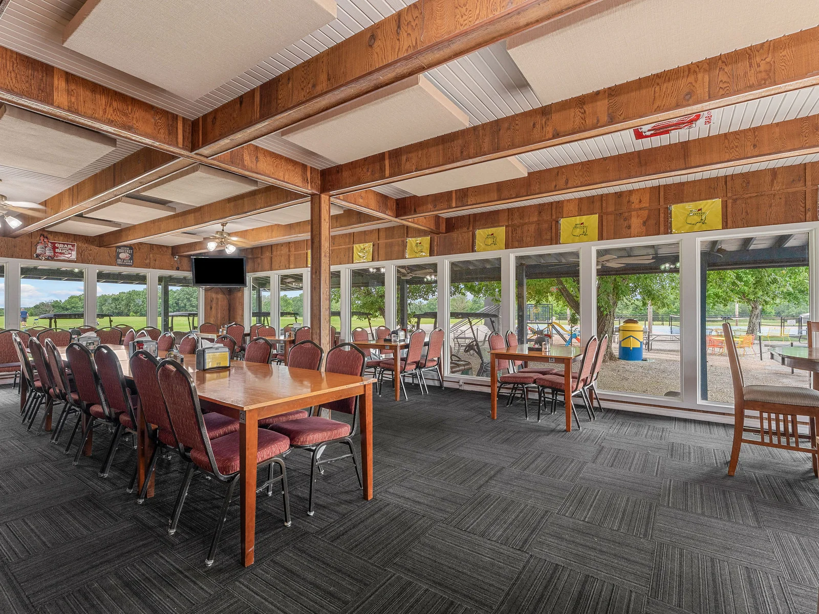 The community dining hall at Lost Woods Hideaway — open for meals during peak season. Burgers, pizza, and a full bar without leaving the property.