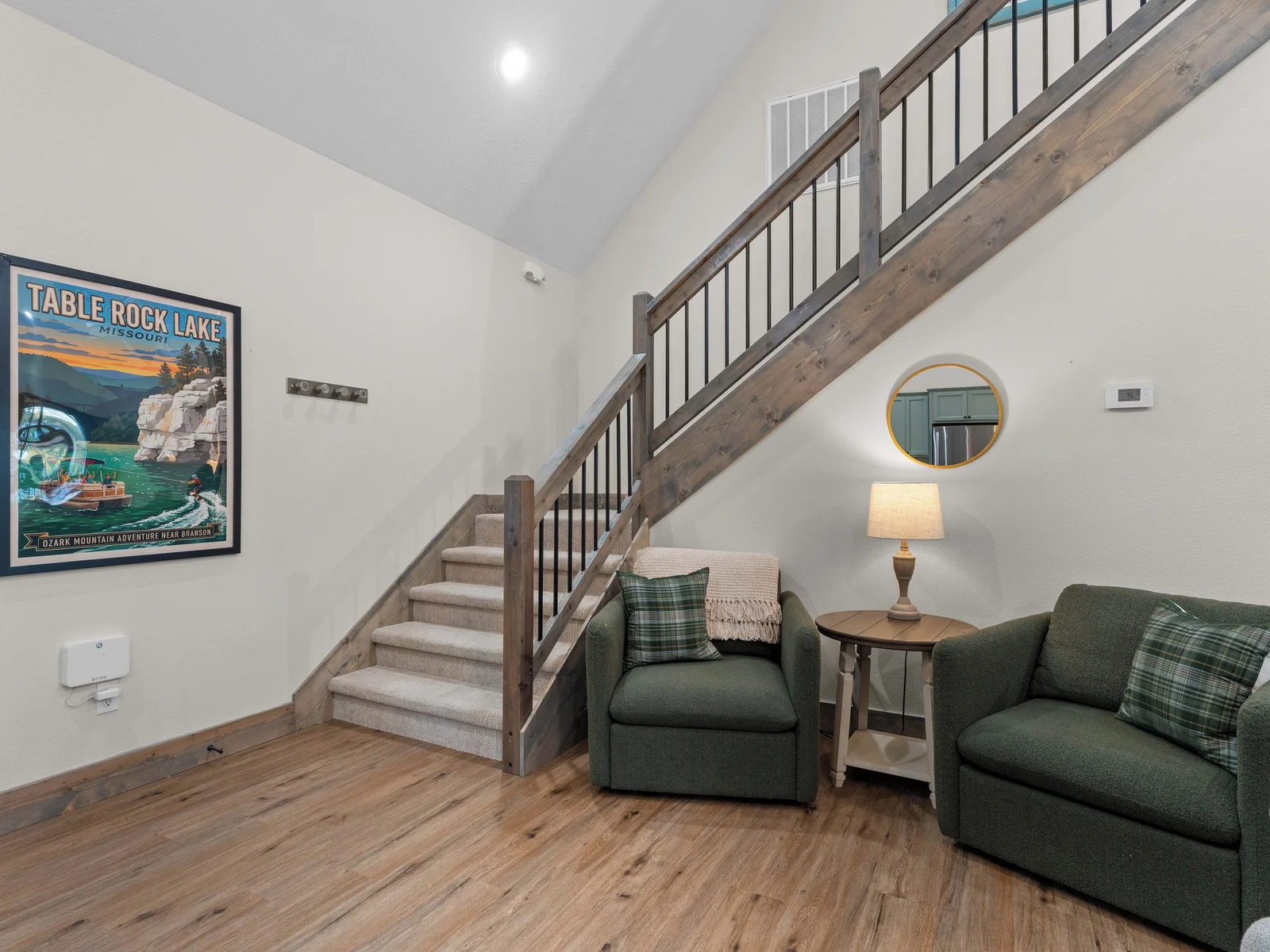 Open concept stairs leading to kid's room upstairs.