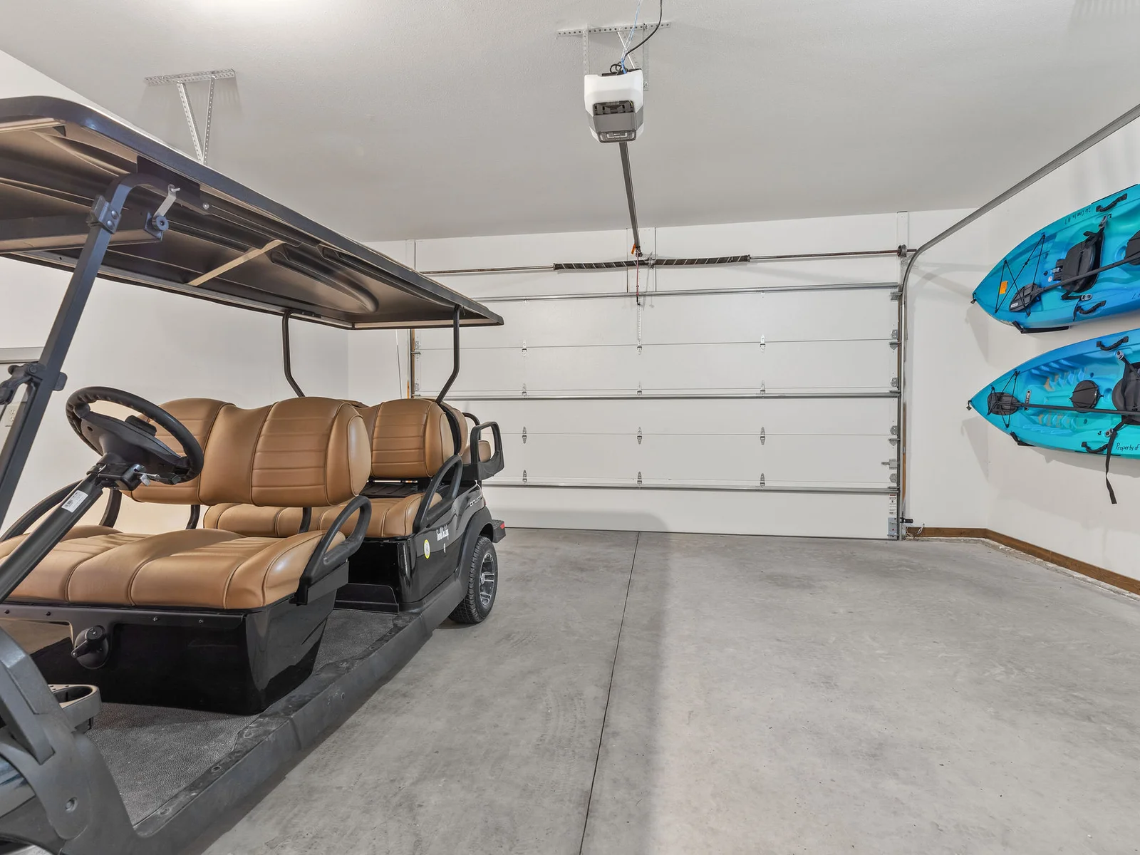 Golf cart and 2 Kayaks included with your home!