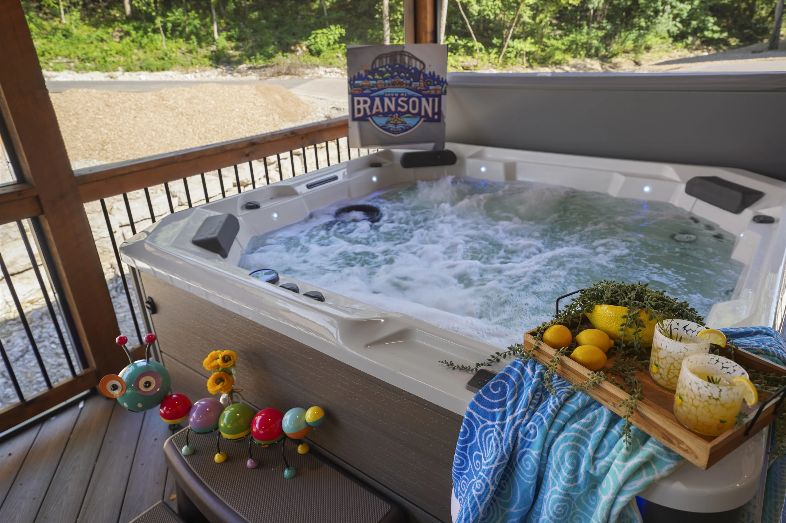Relax in the hot tub on your covered and screened deck