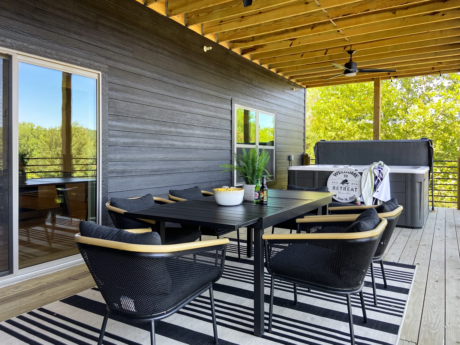 Take advantage of the lower level outdoor dining space adjacent to the hot tub